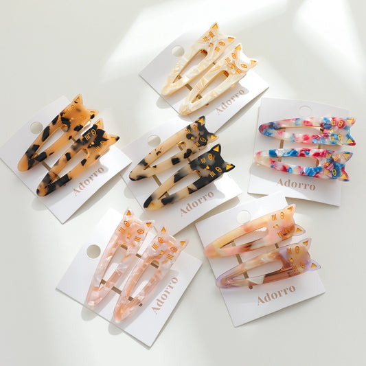 POINTED CAT FACE BARRETTES