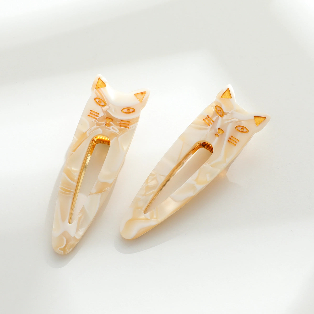 POINTED CAT FACE BARRETTES